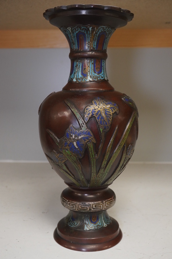 A Japanese bronze and champlevé enamel vase, decorated with irises, 30.5cm high. Condition - fair.